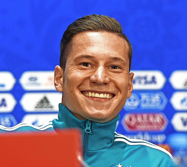 Julian Draxler spielt von Beginn an und verbreitet schon mal Optimismus.   | Foto:  AFP