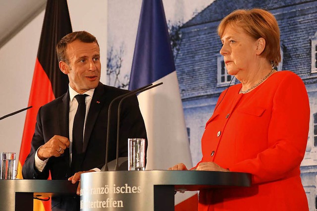 Er will ihre Asylpolitik untersttzen:... Macron und Angela Merkel in Meseberg   | Foto: AFP
