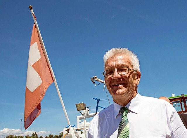 Ministerprsident Winfried Kretschmann in der Schweiz  | Foto: dpa