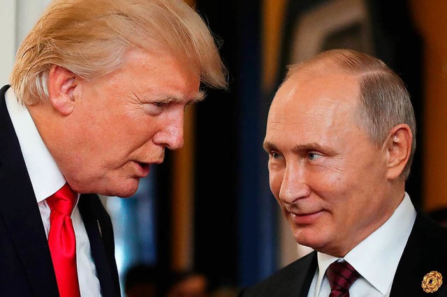 Donald Trump (links) trifft auf Wladimir Putin  | Foto: AFP