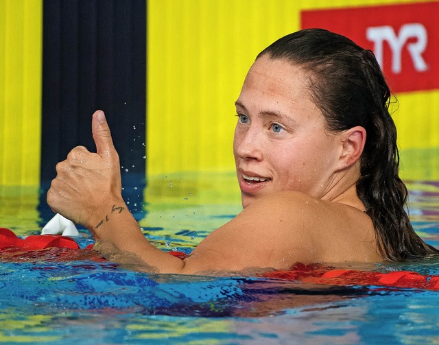 Schwimmerin Sarah Khler freut sich hi...nach dem 1500-Meter-Freistil-Rennen.    | Foto: dpa