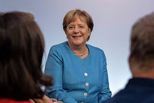 Gut gelaunt: Bundeskanzlerin Merkel beim Brgerdialog in Jena.  | Foto: AFP