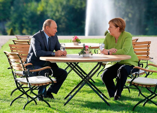 Putin und Merkel kennen sich schon lange.  | Foto: AFP