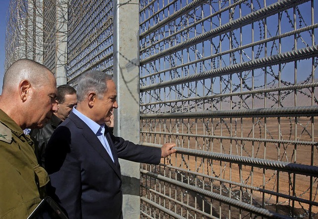 Der israelische Premier Benjamin Netan...Nationalitten-Gesetzes in der Kritik.  | Foto: Marc Israel Sellem / Pool