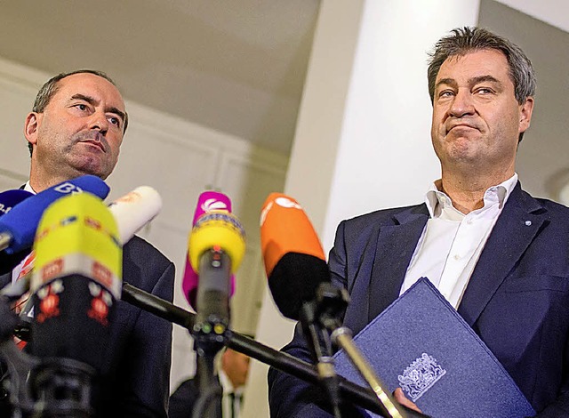 Wunschpartner: Hubert Aiwanger (FW, links) und Markus Sder (CSU)  | Foto: dpa