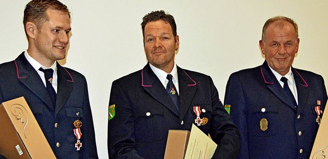 Fr langjhrige Feuerwehrzeit wurden g...ahre) sowie Achim Seifried (40 Jahre)   | Foto: Lck