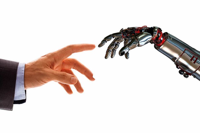 Mensch und Roboter werden knftig enger zusammenarbeiten.  | Foto: Adobe