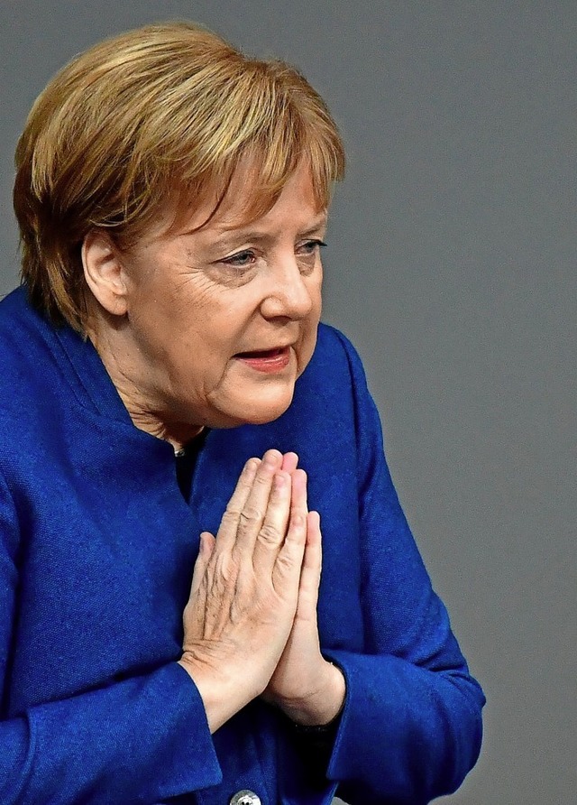 Emotionale Rede: Angela Merkel spricht vor dem Bundestag.  | Foto: AFP
