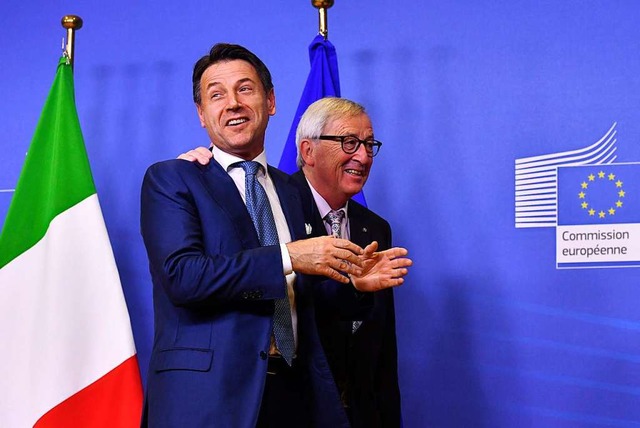 Noch mal gut gegangen: Italiens Premie...mmissionsprsident Jean-Claude Juncker  | Foto: dpa