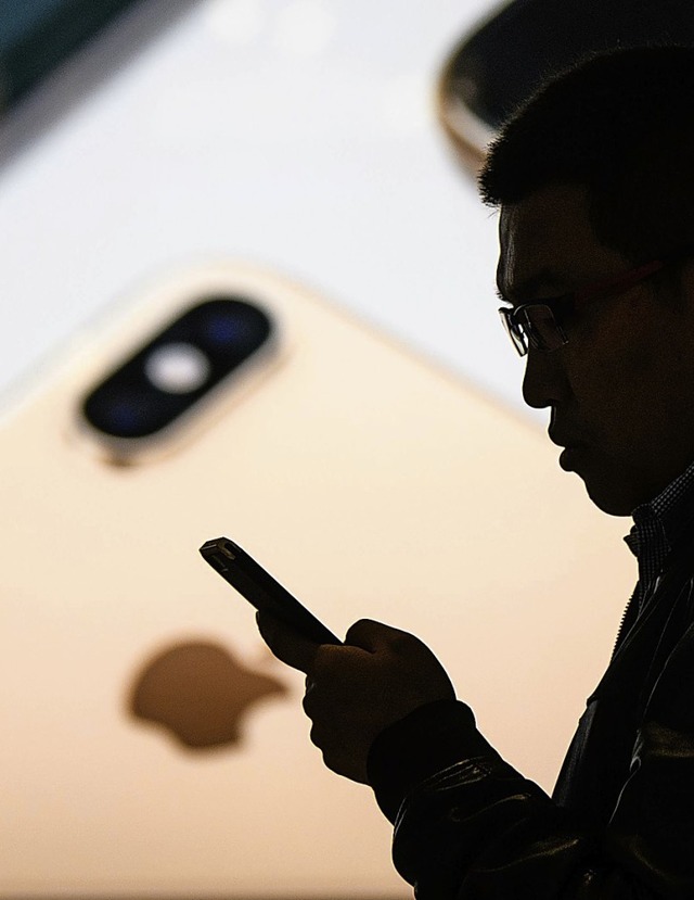 In China werden deutlich weniger iPhones verkauft.   | Foto: AFP
