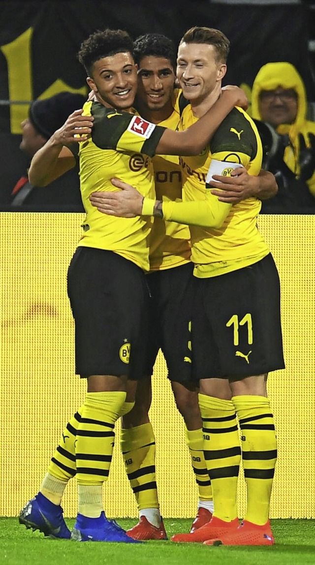 Dortmunder Glck: Jadon Sancho, mit de...raf Hakimi und Marco Reus (von links)   | Foto:  afp