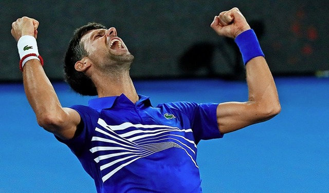 Die Sieger: Novak Djokovic und Naomi Osaka   | Foto: AFP