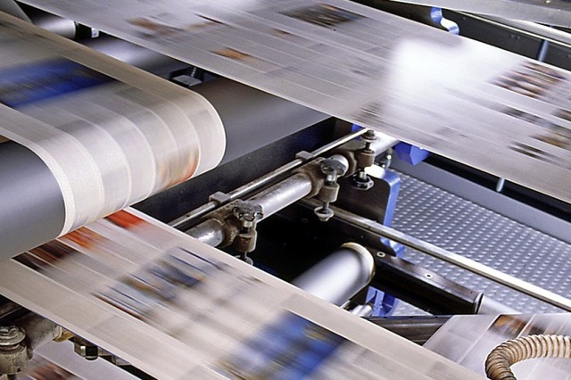 Ziemlich schnell: Papierbahnen in der Druckmaschine  | Foto: KBA