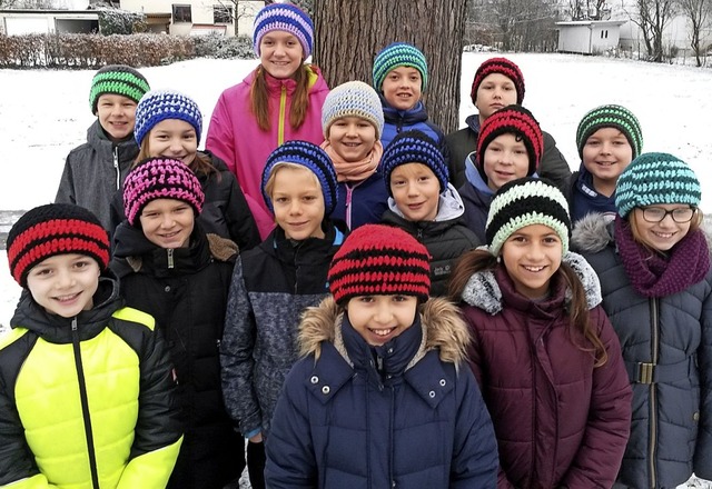 Dank der Mtzen haben die Kinder jetzt immer warme Kpfe!   | Foto: Schroers