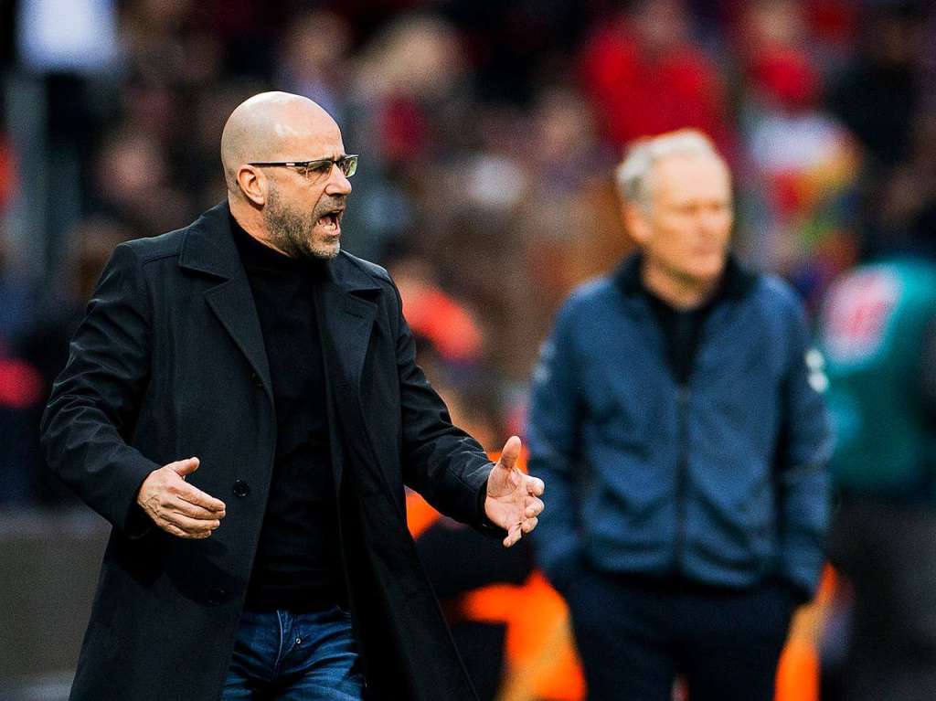 Peter Bosz, sein Trainerkollege auf der anderen Seite.