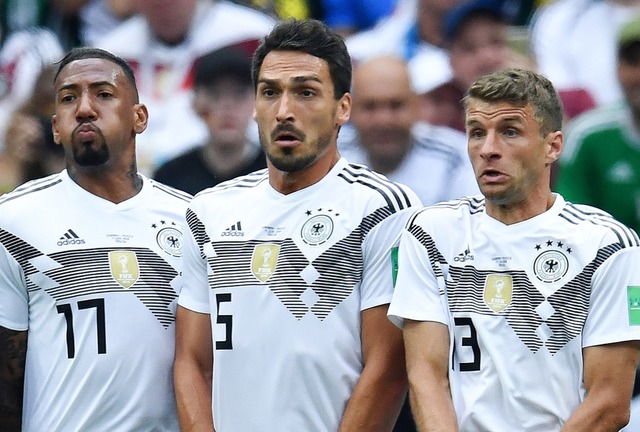 Nicht mehr Nationalspieler (von links)...oateng, Mats Hummels und Thomas Mller  | Foto: AFP