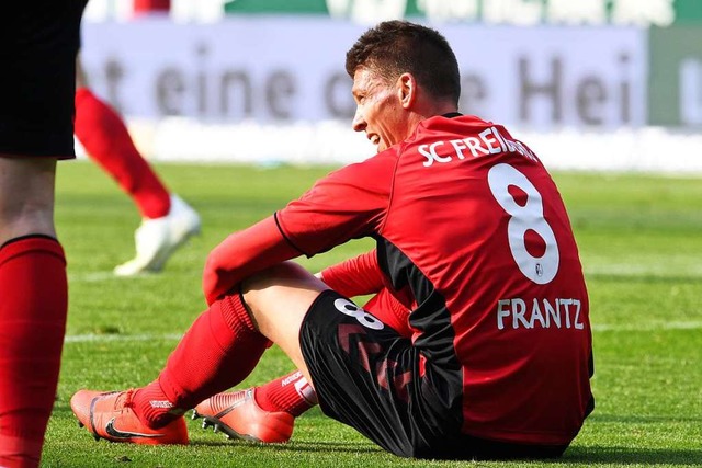 Der SC Freiburg verliert unglcklich i... die Niederlage im Sitzen verarbeiten.  | Foto: dpa