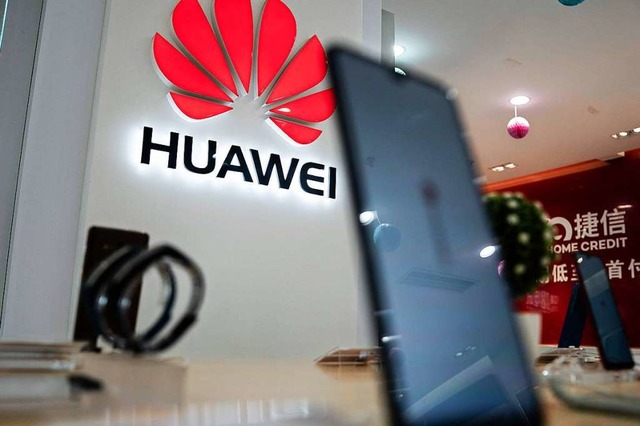 Nach dem Technologiebann durch die US-Regierung muss Huawei reagieren.  | Foto: FRED DUFOUR (AFP)