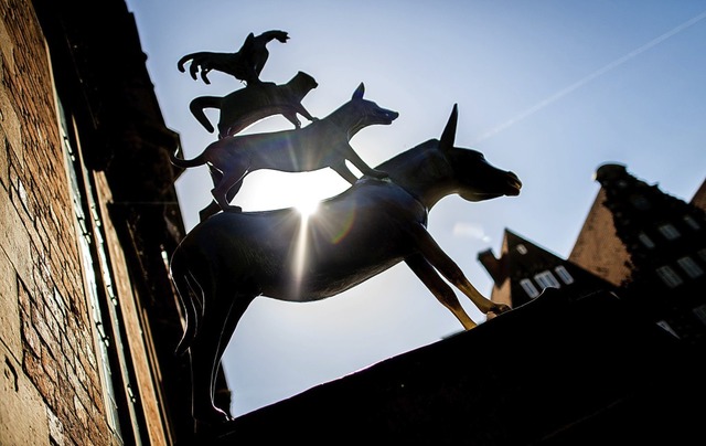 Wird geliebt: Skulptur der Bremer Stadtmusikanten von Gerhard Marcks   | Foto: Hauke-Christian Dittrich (dpa)