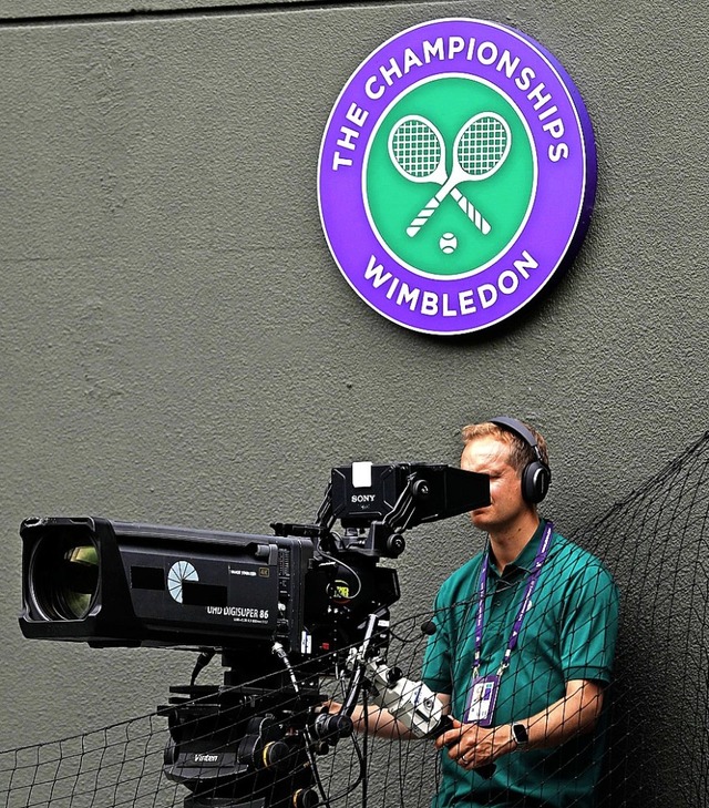 Kameramann in Wimbledon  | Foto: ADRIAN DENNIS (AFP)