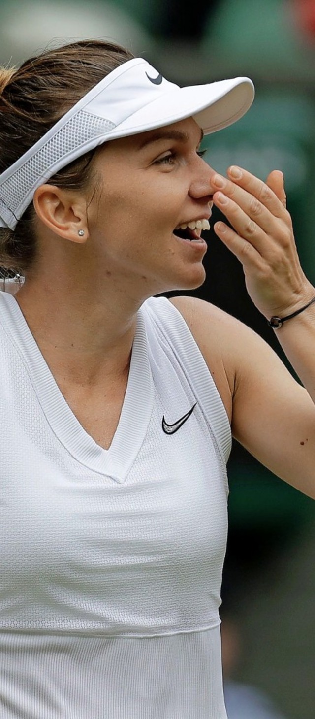 Das schaffte nicht mal der grte rum... Simona Halep ist Wimbledon-Siegerin.   | Foto: BEN CURTIS (AFP)