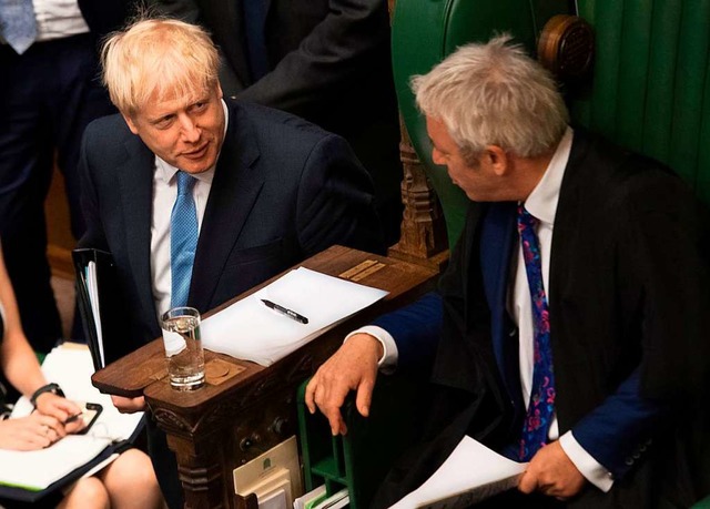 Premierminister Boris Johnson (l.) und...isch motivierte Schlieung verhindern.  | Foto: JESSICA TAYLOR (AFP)