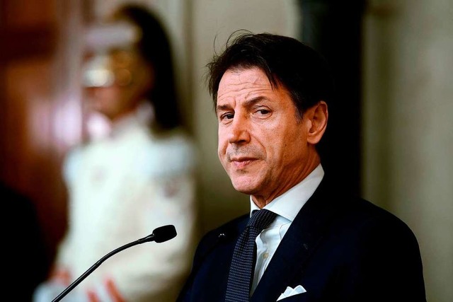 Italiens alter und neuer Regierungschef Guiseppe Conte  | Foto: FILIPPO MONTEFORTE (AFP)
