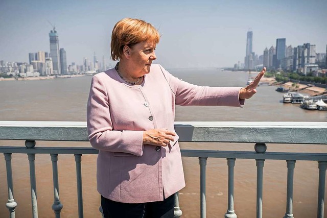 Angela Merkel in der chinesischen Provinz Hubei  | Foto: Michael Kappeler (dpa)