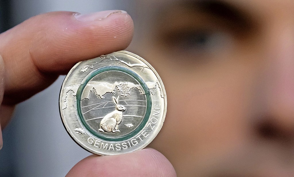 Fünf-Euro-Münze mit grünem Rand - Wirtschaft - Badische Zeitung