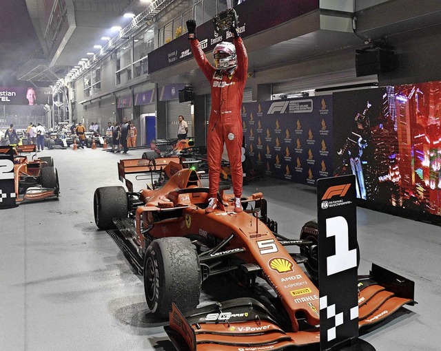 Erstbesteigung in dieser Saison: Sebas...rfolg in der Formel 1 seit 392 Tagen.   | Foto: MLADEN ANTONOV (AFP)