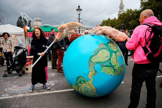 Klimaschtzer protestieren in London.  | Foto: ISABEL INFANTES (AFP)