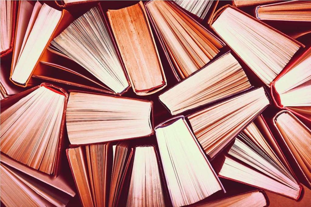 In Büchern können Welten stecken. Man muss sie nur lesen.  | Foto: BillionPhotos.com  (stock.adobe.com)