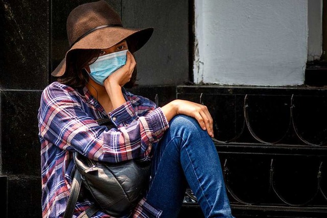 Mit dem Mundschutz gegen Luftverschmutzung?  | Foto: Jair Cabrera Torres (dpa)