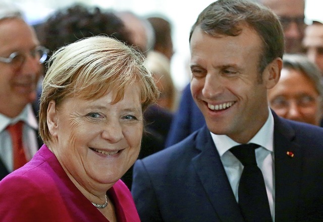 Angela Merkel und Emmanuel Macron habe...n auch fr Rstungsgter verstndigt.   | Foto: Frederic Scheiber (dpa)