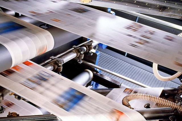 Machen Tempo: Papierbahnen in der Druckmaschine  | Foto: KBA
