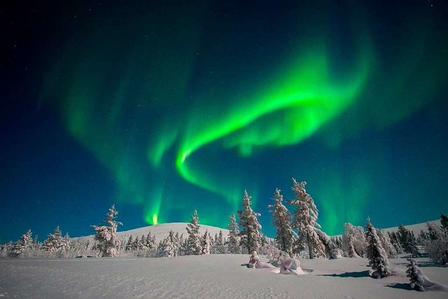 Aurora borealis ber nordnorwegischer Landschaft  | Foto: Walter und Annemarie Taeschner