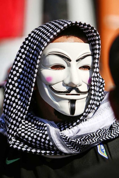 Guy-Fawkes-Maske bei einer Demonstration in Baghdad, Irak  | Foto: SABAH ARAR (AFP)