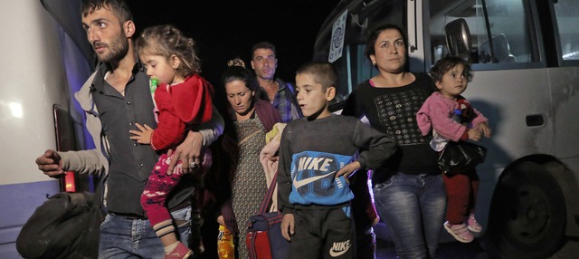 Auf der Flcht vor dem trkischen Einm...Gruppe erreicht das Lager Bardarasch.   | Foto: SAFIN HAMED