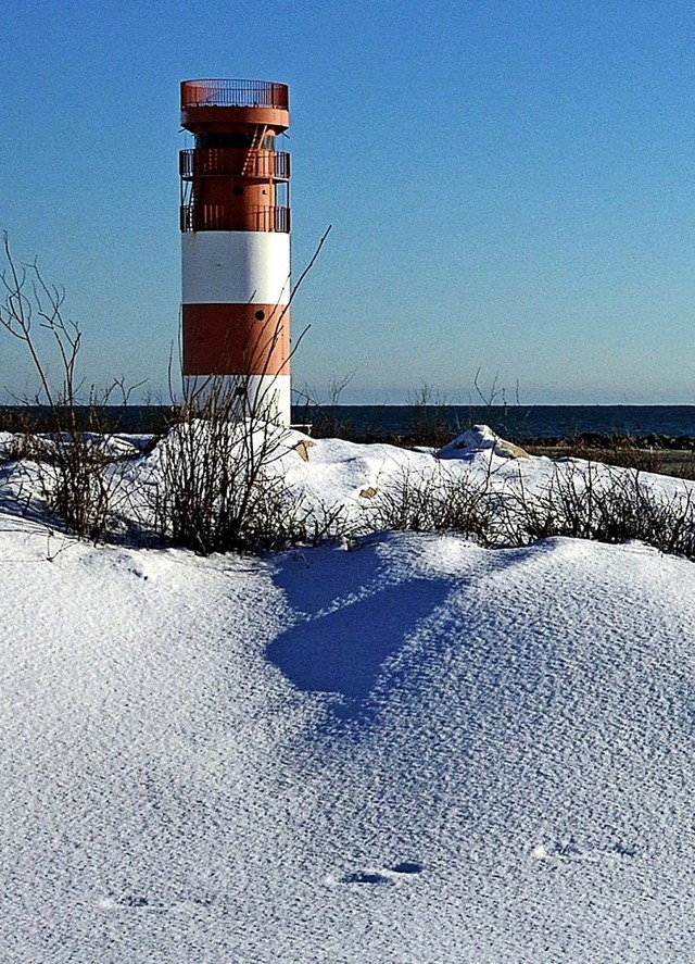 Markant: Der Leuchtturm von Helgoland steht auf Dne  | Foto: Brigitte Rauch (dpa)