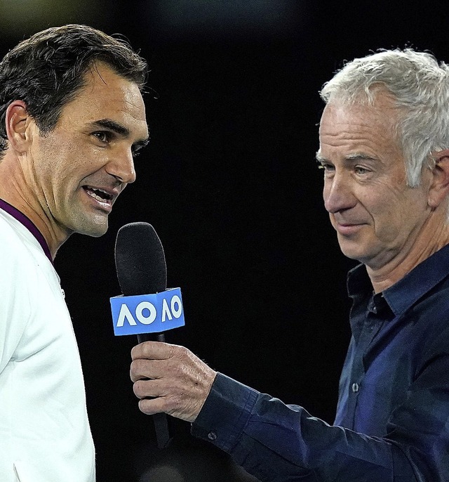 Roger Federer (links) und John McEnroe  | Foto: Michael Dodge (dpa)