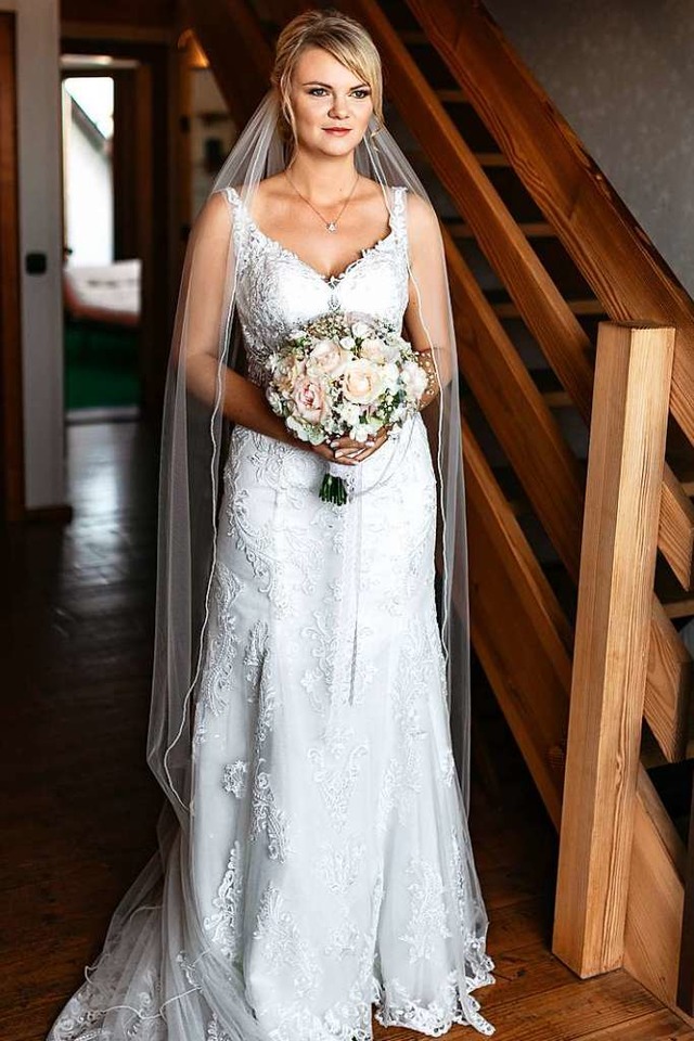 Alesia Baumgrtner in ihrem Brautkleid.  | Foto: Dmytro Zasukha