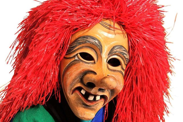 Die Maske der Neuenburger Brunnebutzer... ihren langen roten Haaren sofort auf.  | Foto: die photoLounge | Sabrina Hoch