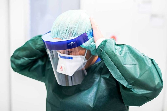 Deutschland wird Experten zufolge mit ...en Coronavirus dauerhaft leben mssen.  | Foto: Marcel Kusch (dpa)