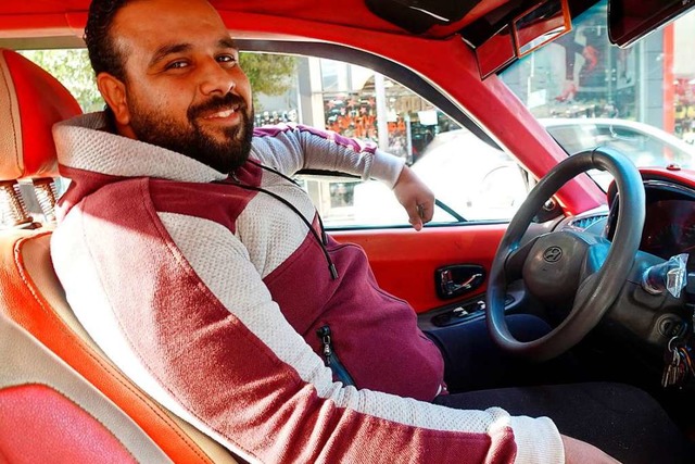 Hupen sei eine eigene Sprache, mit der...n knne, sagt Taxifahrer Mahmoud Saad.  | Foto: Johannes Schmitt-Tegge (dpa)