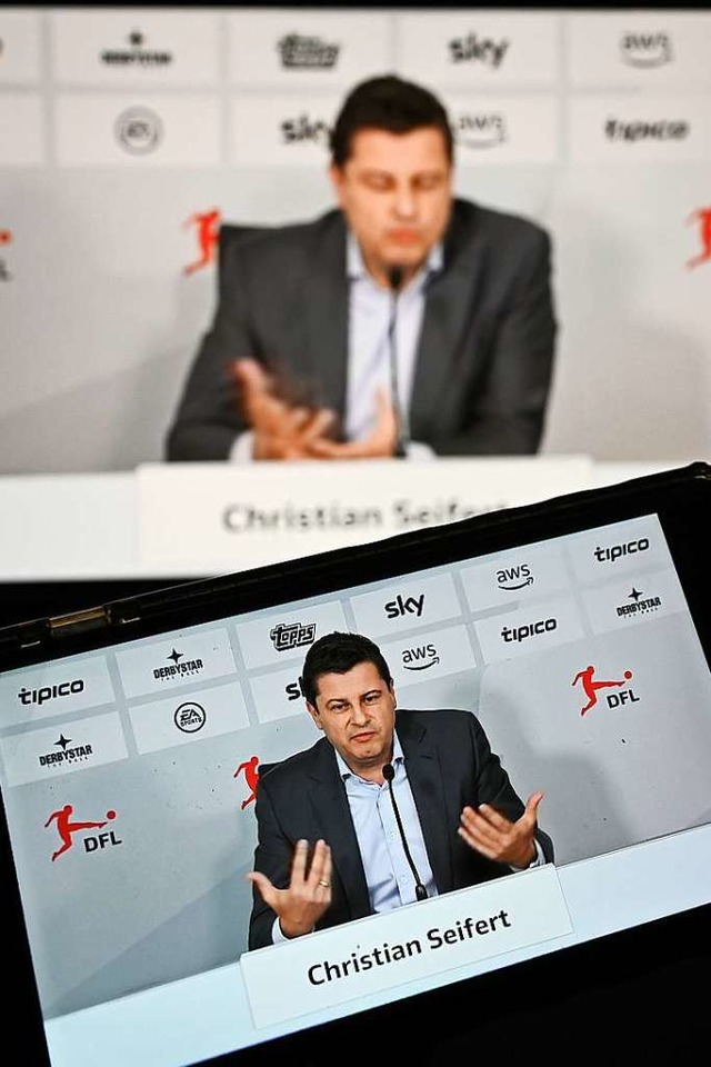 DFL-Chef Christian Seifert whrend der virtuellen Pressekonferenz.  | Foto: Arne Dedert (dpa)