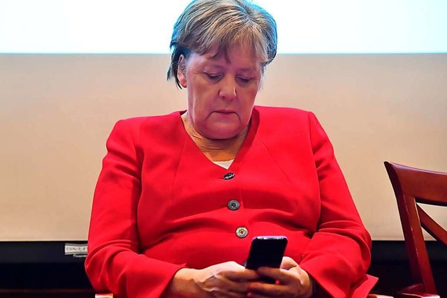Auch Bundeskanzlerin Angela Merkel betreibt einen Podcast.  | Foto: Clemens Bilan (dpa)