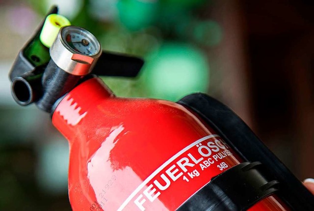 Ein griffbereiter Feuerlscher und des...stattbrand, groen Schaden verhindert.  | Foto: Christin Klose (dpa)