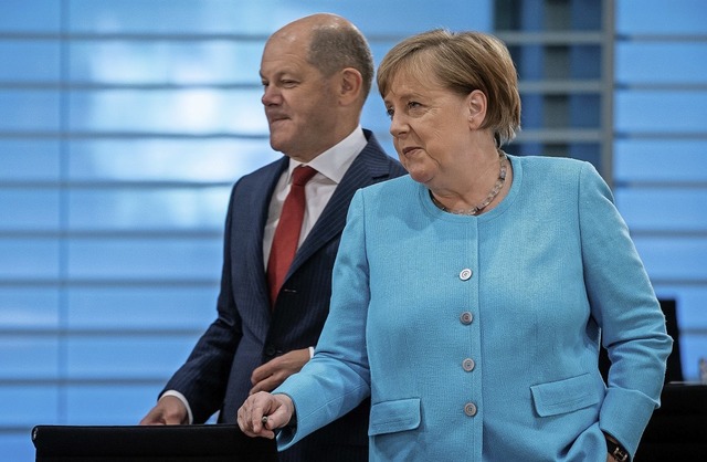 Bundeskanzlerin Angela Merkel (CDU) und Vizekanzler Olaf Scholz (SPD)  | Foto: Michael Kappeler (dpa)