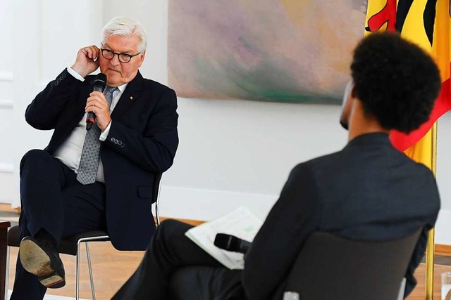 Der Bundesprsident bei einer Diskussionsrunde  | Foto: ANNEGRET HILSE (AFP)