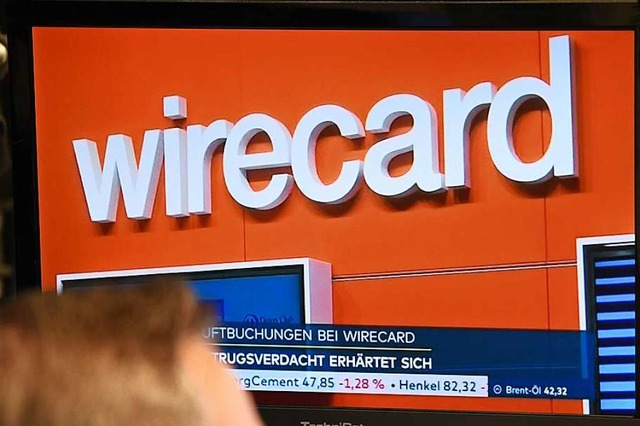Wirecard steht im Zentrum eines mutmalichen Bilanzskandals.  | Foto: Arne Dedert (dpa)